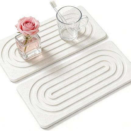 Quick Dry Stone Absorbent Trays with elegant design, perfect for kitchen or bathroom, showcasing flowers and glass.